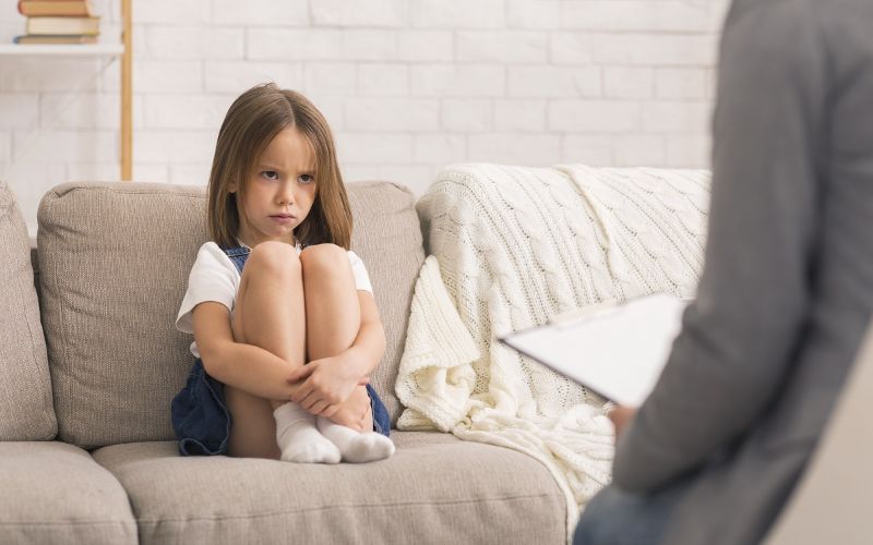 A young girl affected by her trauma