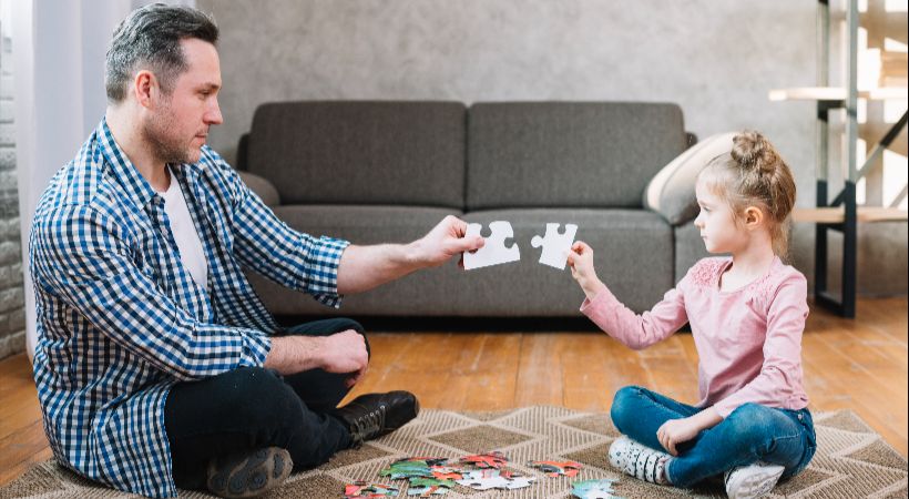 Someone working with a child to process their trauma 