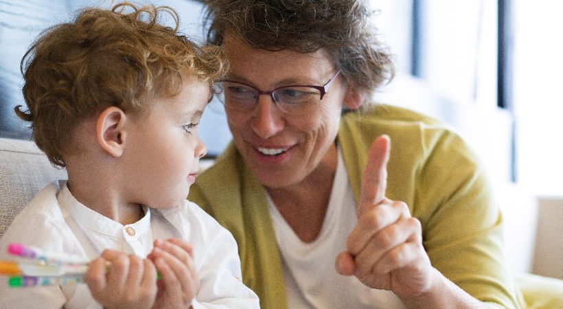 Child being supported by adult