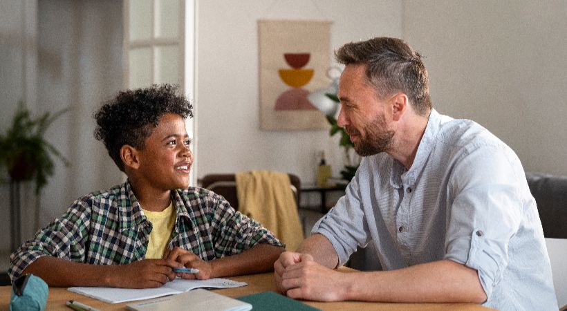 Teacher providing support for child