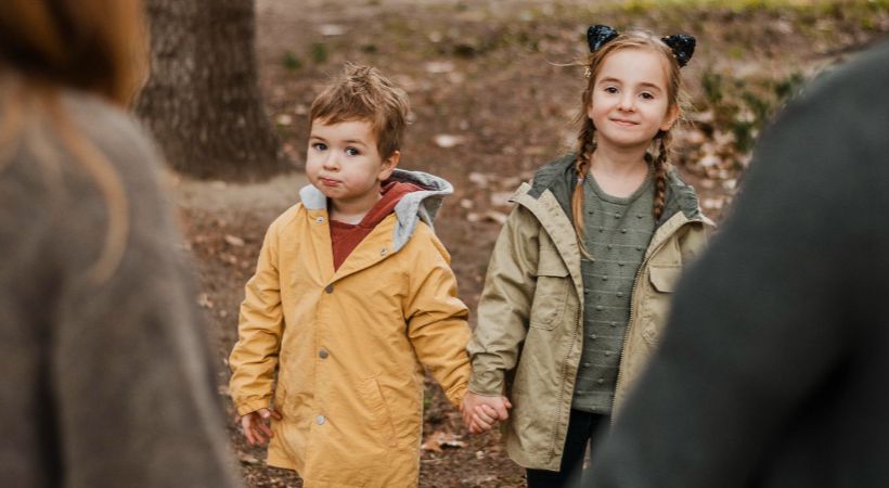 Two kids with support after asylum seeking