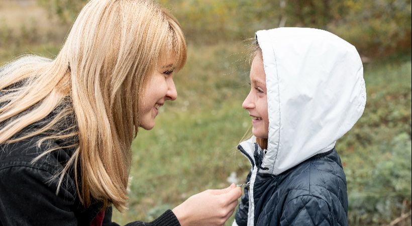 Support worker helping an asylum seeking child 