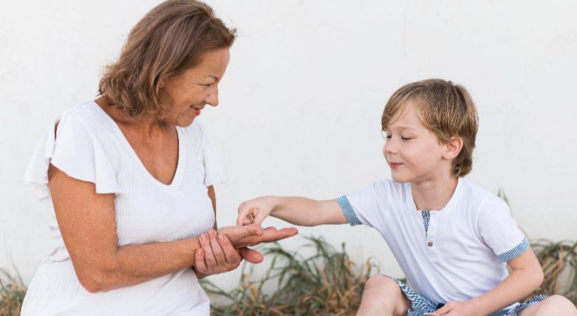 Child receiving support with their attachment. 